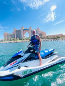 Riders enjoying a guided jet ski tour on the crystal-clear waters of Dubai