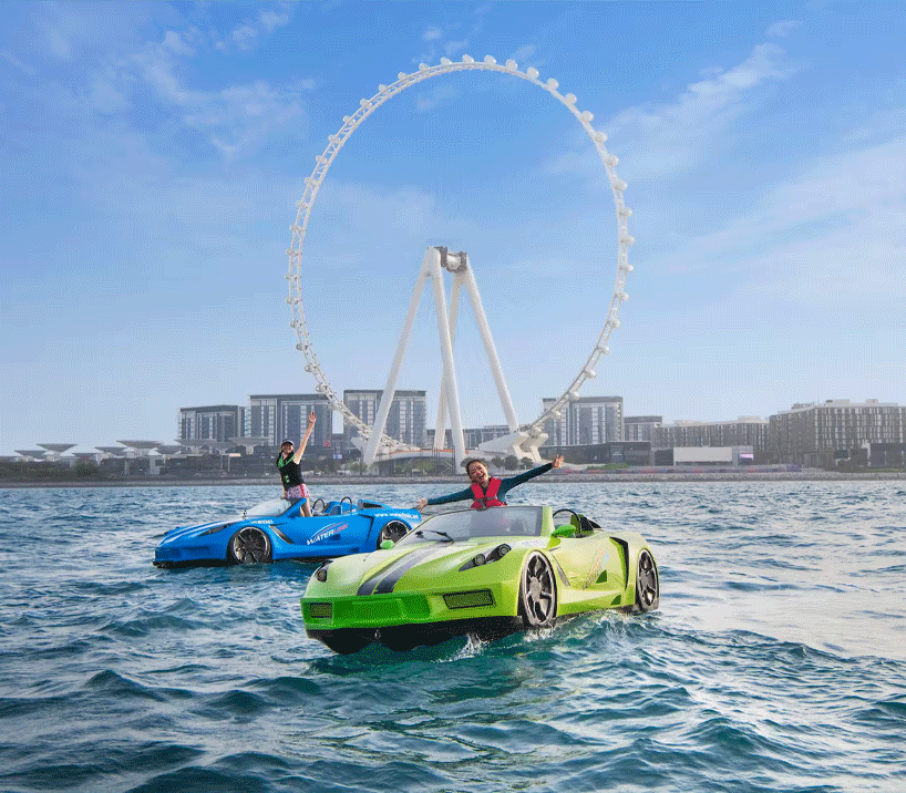 JetCar speeding across the clear blue waters of Dubai