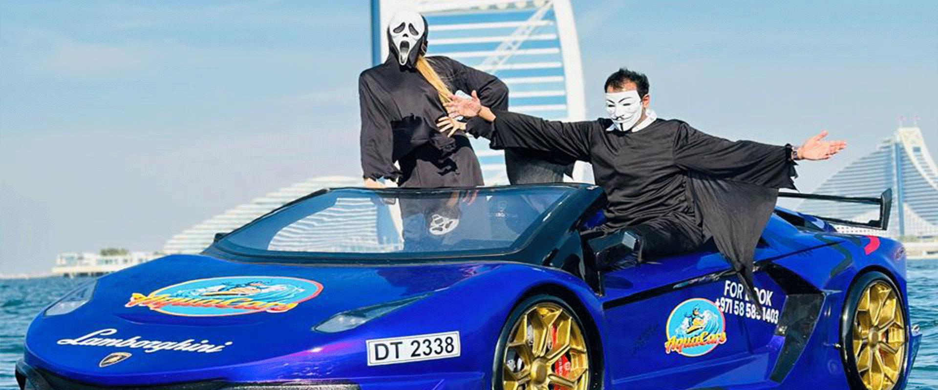 JetCar racing across the sparkling waters of Dubai with the city's iconic skyline